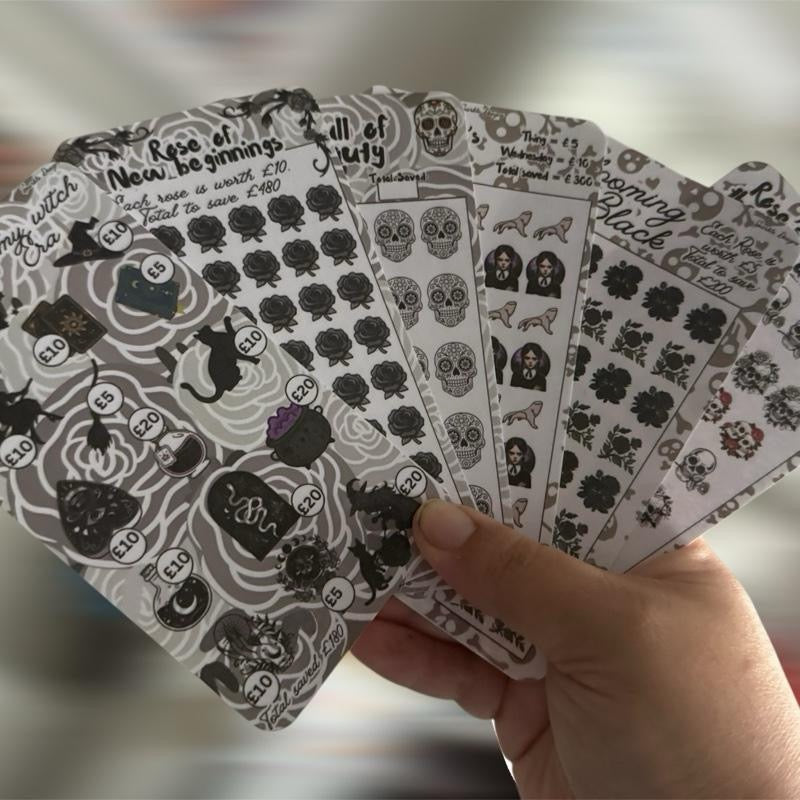 Black rose, Wednesday & skull themed saving challenge trackers can come With matching inserts & wallets too