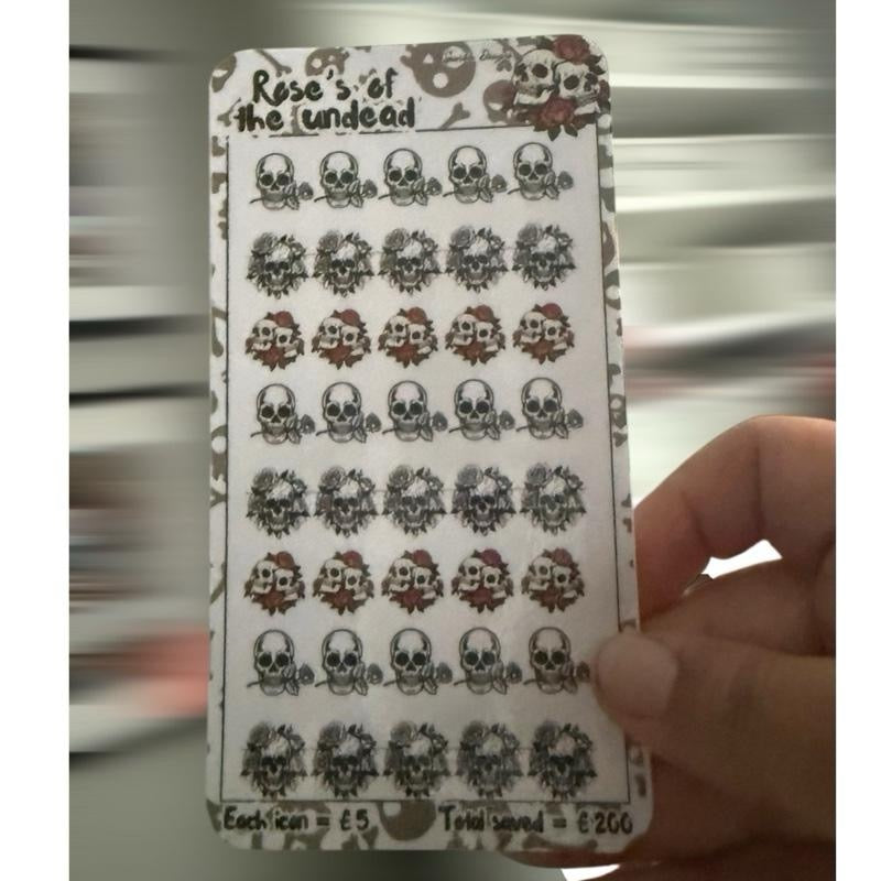 Black rose, Wednesday & skull themed saving challenge trackers can come With matching inserts & wallets too