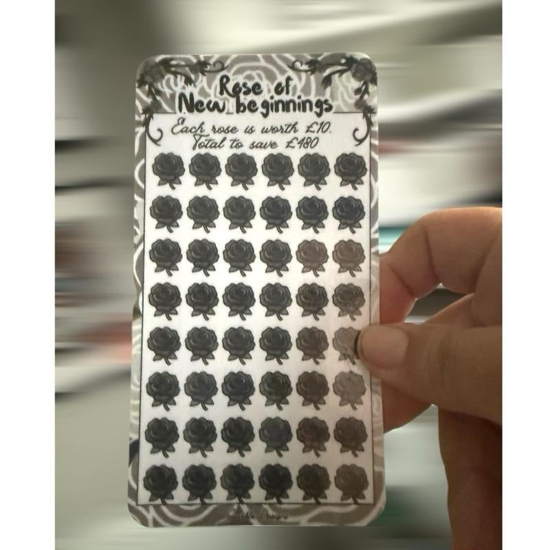 Black rose, Wednesday & skull themed saving challenge trackers can come With matching inserts & wallets too