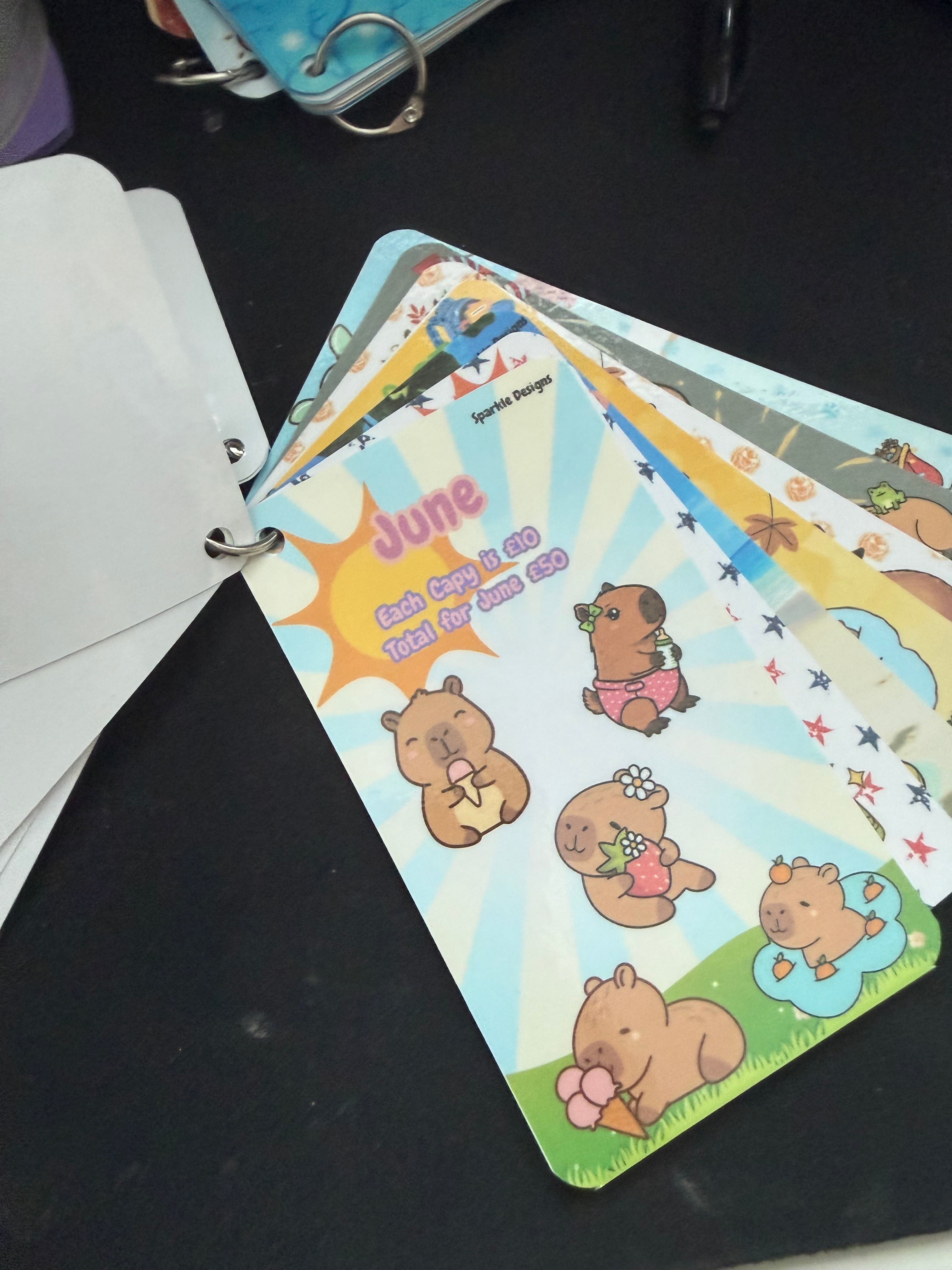 Cute capybara monthly saving challenge tracker - ring tracker - saves £600